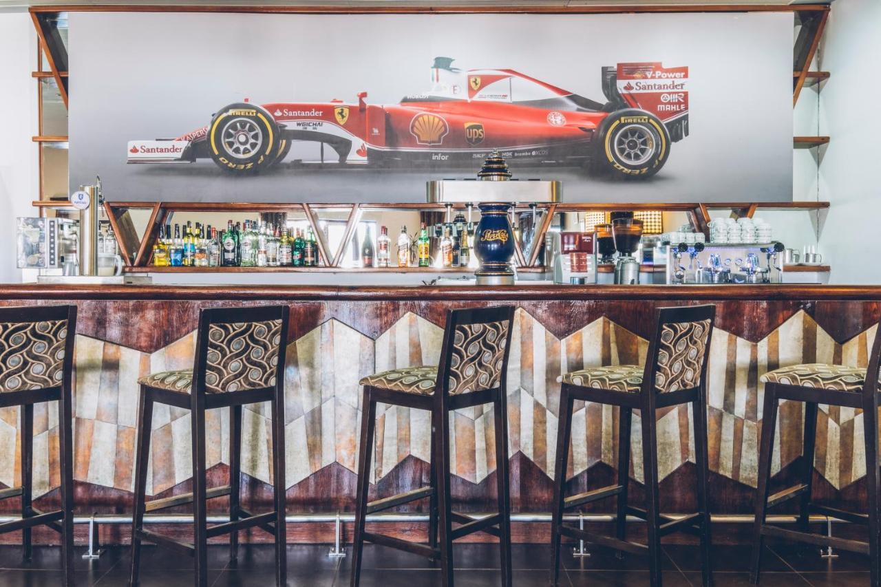 Iberostar Waves Saidia Hotel Ngoại thất bức ảnh The bar at the Ferrari Store in Maranello